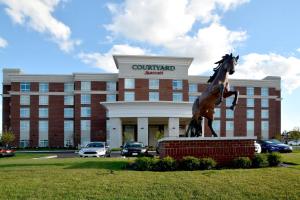 a statue of a horse in front of a building at Courtyard by Marriott Youngstown Canfield in Canfield