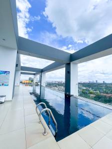 a swimming pool on the top of a building at Escada Next level luxurious 1 bed home in Nairobi