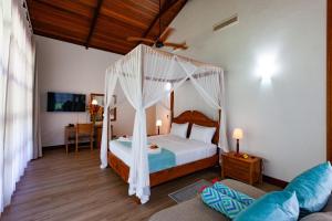 Postel nebo postele na pokoji v ubytování Anse Lazio Lodge