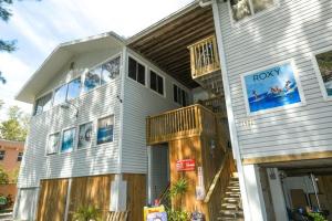 a large house with a balcony on the side of it at Guld Drive House #54599 Home in Holmes Beach