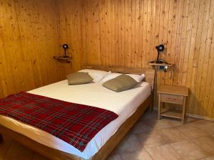 Letto o letti in una camera di Testa Grigia