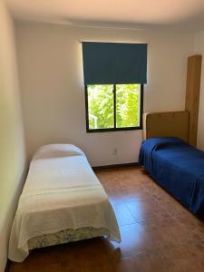 Postel nebo postele na pokoji v ubytování Casa aurora