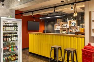 Bebidas en Vienna House Easy by Wyndham Bremen City Apartments