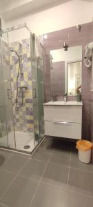 a bathroom with a shower and a sink at Portonaccio suite - Stazione Tiburtina - Università - Metro B in Rome