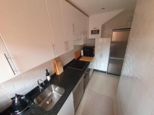 Dapur atau dapur kecil di Pure Beach Penthouse & Swimming pool, 3 bedrooms