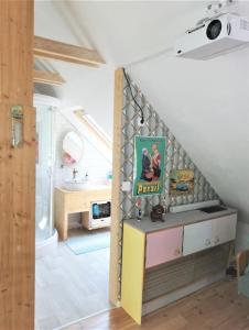 a living room with a staircase and a room with at Space Loft Graz in Graz