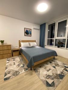 Posteľ alebo postele v izbe v ubytovaní Pattern apt Rodos