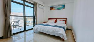 Postel nebo postele na pokoji v ubytování Ocean Breeze Apartment