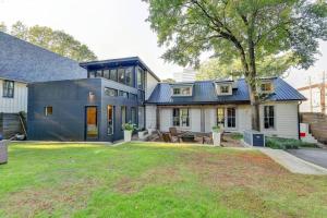 a house with a large yard in front of it at Modern Farm house in heart of the City- Sleeps 8 in Atlanta