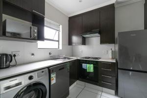 Virtuvė arba virtuvėlė apgyvendinimo įstaigoje K Luxe Apartment