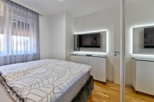 Nova Nexus Apartment客房内的一张或多张床位