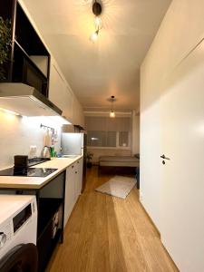 Kuchyň nebo kuchyňský kout v ubytování Savi Apartment 5