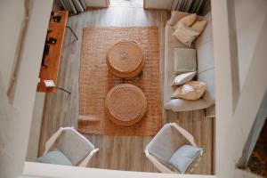 an overhead view of a room with chairs and tables at Thyme Out Weltevreden Farm in Curryʼs Post