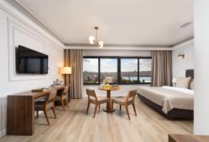 Postel nebo postele na pokoji v ubytování Elan Hotel Istanbul Pera