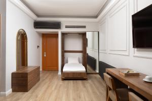 Postel nebo postele na pokoji v ubytování Elan Hotel Istanbul Pera