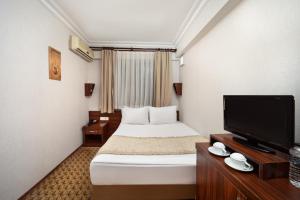 Postel nebo postele na pokoji v ubytování Elan Hotel Istanbul Pera