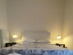 Ліжко або ліжка в номері Res Sant'Eufemia