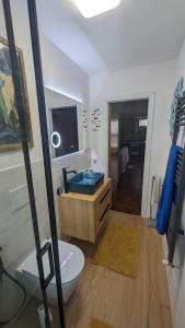 a bathroom with a tub and a toilet and a sink at Casa Vacanza San Piero in San Piero in Campo