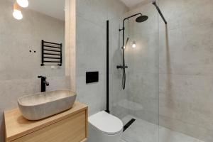 Et badeværelse på Morze Apartamenty by Grand Apartments