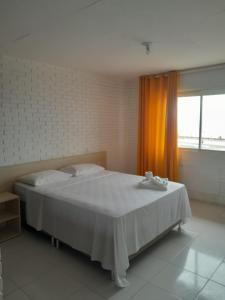 Voodi või voodid majutusasutuse Hotel Sambura toas