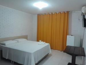 Postelja oz. postelje v sobi nastanitve Hotel Sambura