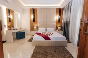 Voodi või voodid majutusasutuse Ramage Hotel & Resort toas
