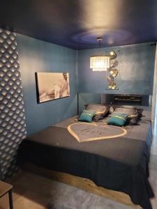 Кровать или кровати в номере L'Eden du Quercy
