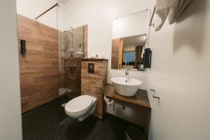 Koupelna v ubytování Hotel Vos