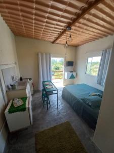 Postel nebo postele na pokoji v ubytování Mar de Arraial, Suites da Ju