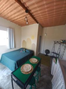 Postel nebo postele na pokoji v ubytování Mar de Arraial, Suites da Ju