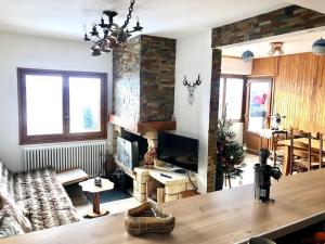 Χώρος καθιστικού στο Chalet spacieux et convivial LA TOUSSUIRE