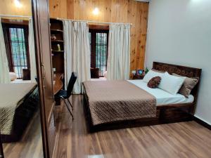 a bedroom with a bed in a room with wooden walls at The Rustic Manor - Homestay in Bangalore