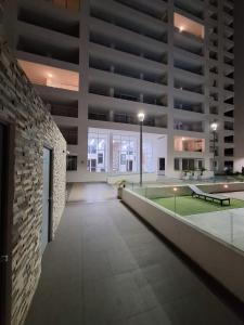 an empty building with a tennis court in the middle at ARICA SUNSET in Arica