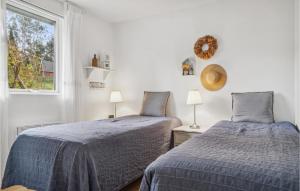 Postel nebo postele na pokoji v ubytování Amazing Home In Ebeltoft With Wifi
