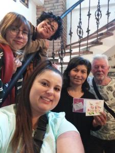 a group of people posing for a picture at Golden Gate in Akhaltsikhe