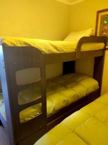 a couple of bunk beds in a room at VISTAMAR COSTALILENES CONCON in Concón +17 photos