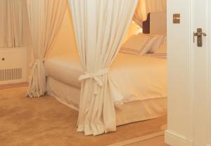 Postel nebo postele na pokoji v ubytování Magda Boutique Rooms
