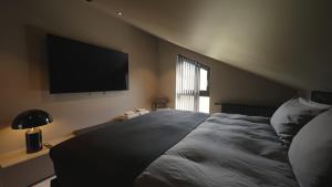 Postel nebo postele na pokoji v ubytování Villa North