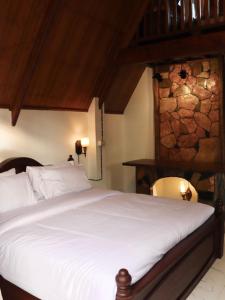 Postel nebo postele na pokoji v ubytování Ban Kaew Mo Ra Glamping & Restaurant