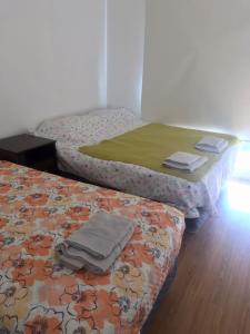 Кровать или кровати в номере Departamento en Ushuaia