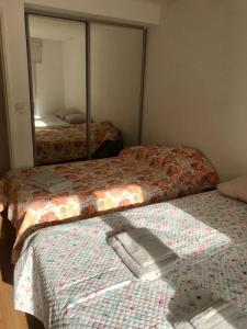 Krevet ili kreveti u jedinici u okviru objekta Departamento en Ushuaia