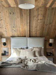 Posteľ alebo postele v izbe v ubytovaní Chalet V11 by Villa 11 Folk & Design
