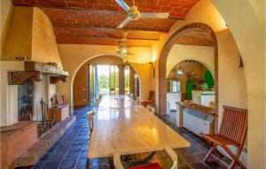 a kitchen with a large wooden table in a room at Pet Friendly Home In Fucecchio With Wi-fi in Fucecchio