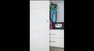 a closet with a dresser and a radio at Petra Beach Hotel in Hersonissos
