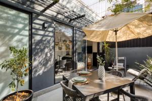 En terrasse eller udendørsområde på ULIV Park Polanco