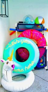 a sign that says unicorn poop and one hump at Casa Grandè in Clearwater