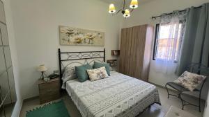 En eller flere senge i et værelse på Green Home-Tenerife Sur