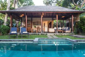 Bazén v ubytování Mango Tree Villas Jimbaran Bali nebo v jeho okolí