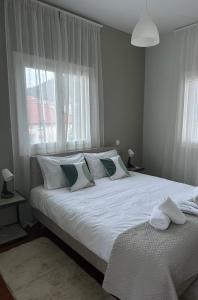 Katil atau katil-katil dalam bilik di Happy Home