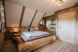 Letto o letti in una camera di Webertonihütte